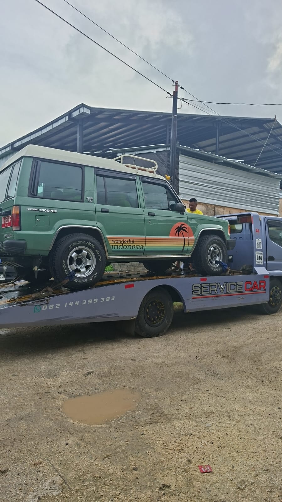 Pengiriman mobil menggunakan towing profesional di Bali